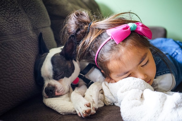 relax like this little girl with her puppy
